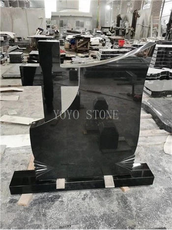 Svart granit monument gravsten